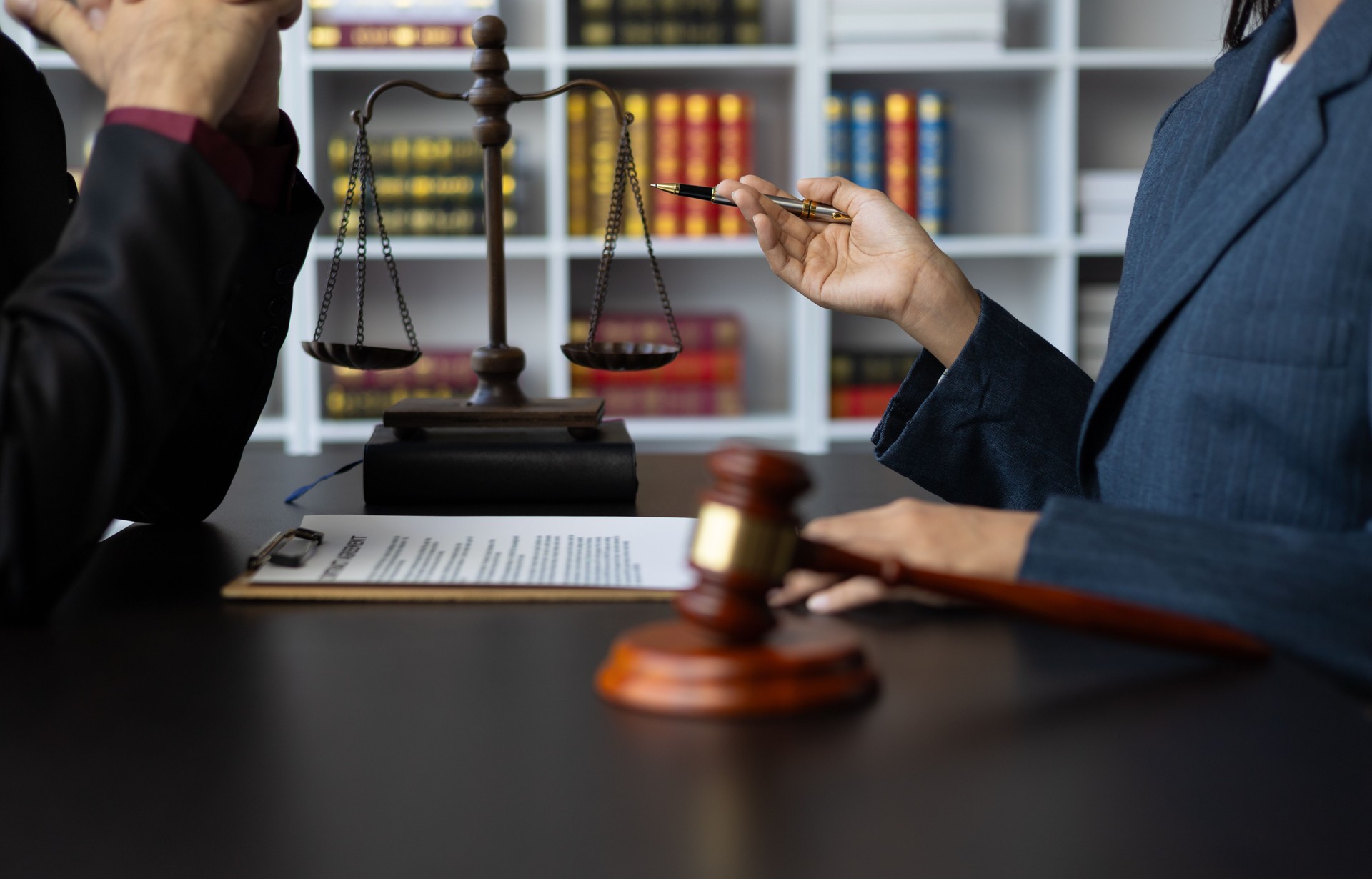 Businessman and lawyer discuss with legal advisor in lawyer's law office. Concept of legal and justice consulting services. Businessman and lawyer discuss with legal advisor in lawyer's law office. Concept of legal and justice consulting services.